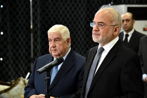 وزير خارجية النظام ونظيره العراقي يدعوان لفتح المعابر بين البلدين