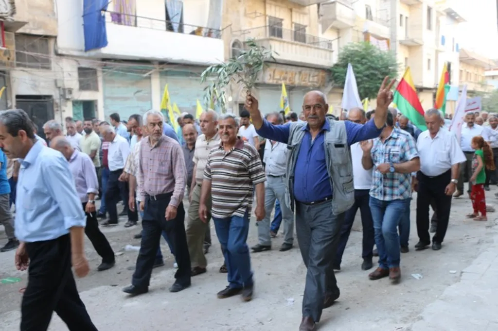 من حلب.. بروح مقاومة العصر وشيلادزي نستنكر الهجمات على عفرين وخاكورك