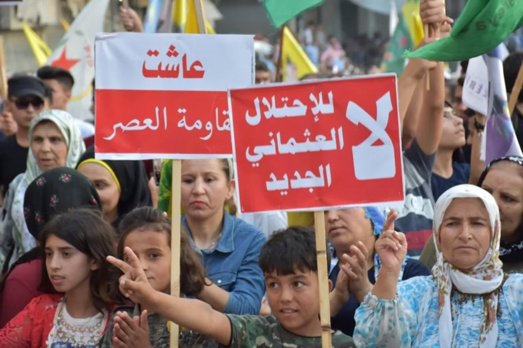 من حلب.. بروح مقاومة العصر وشيلادزي نستنكر الهجمات على عفرين وخاكورك