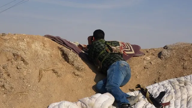 مقاتل من حماة: أحمي أرضي وشعبي من الهجوم التركي