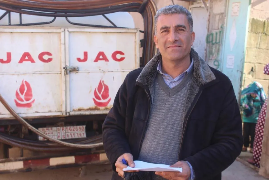 ​​​​​​​مازوت التدفئة يوزّع مجاناً على مُهجّري سري كانيه في الدرباسية