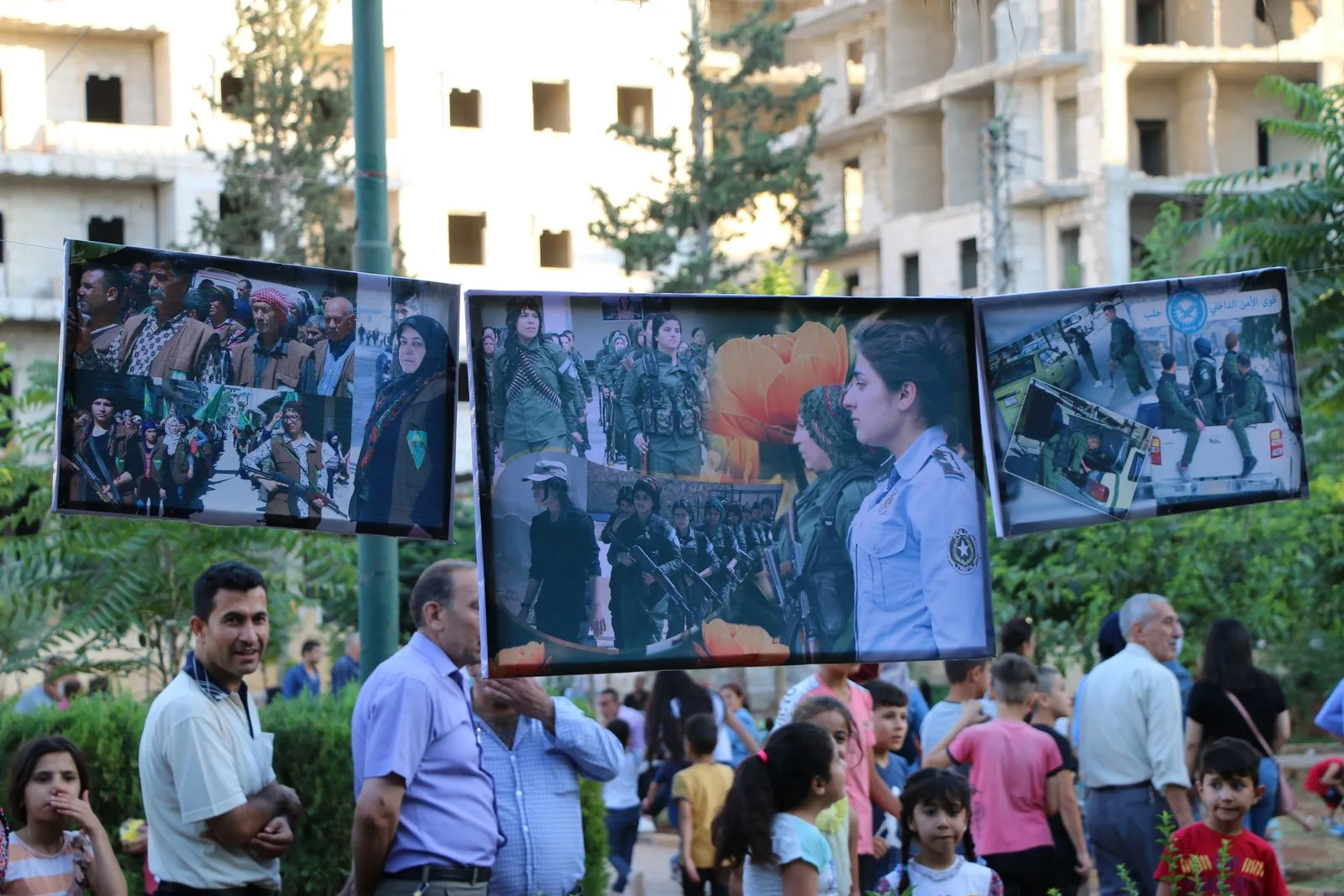 حلب.. اتحاد المرأة الشابة يفتتح معرض صور بمناسبة ذكرى 19 تموز