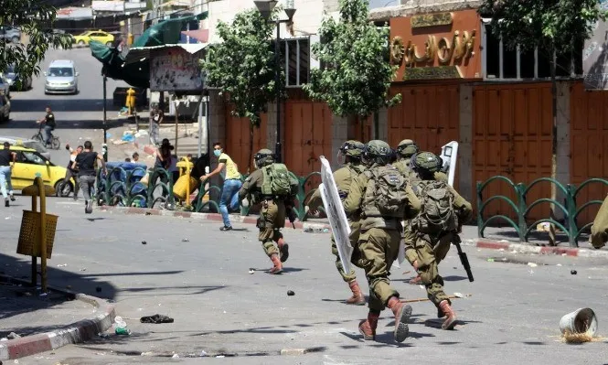 مواجهات في الضفة الغربية: الجيش الإسرائيلي يصيب شقيقين ويعتقلهما