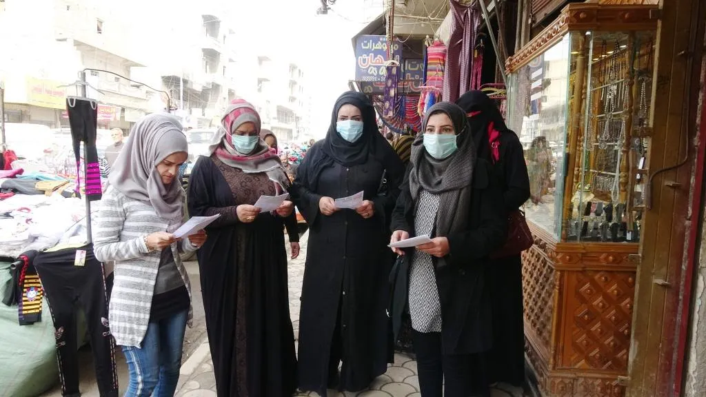 ​​​​​​​توزيع مناشير توعية في الرقة تحث على مناهضة العنف ضد المرأة