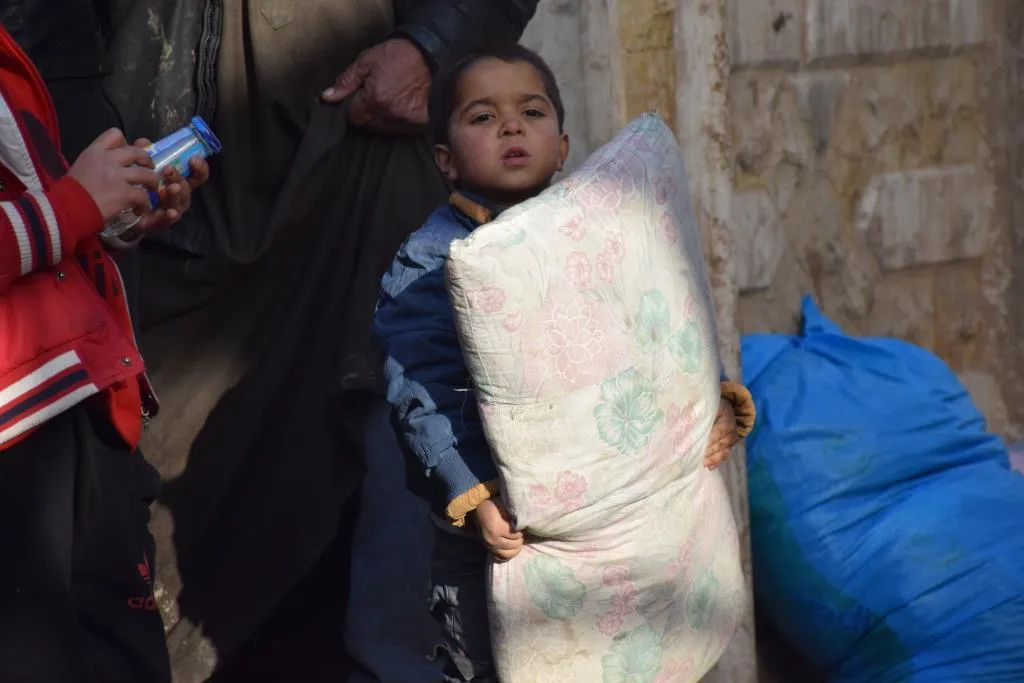 ​​​​​​​بالصور والفيديو.. عودة نازحي حيي "الغويران والزهور" إلى منازلهم