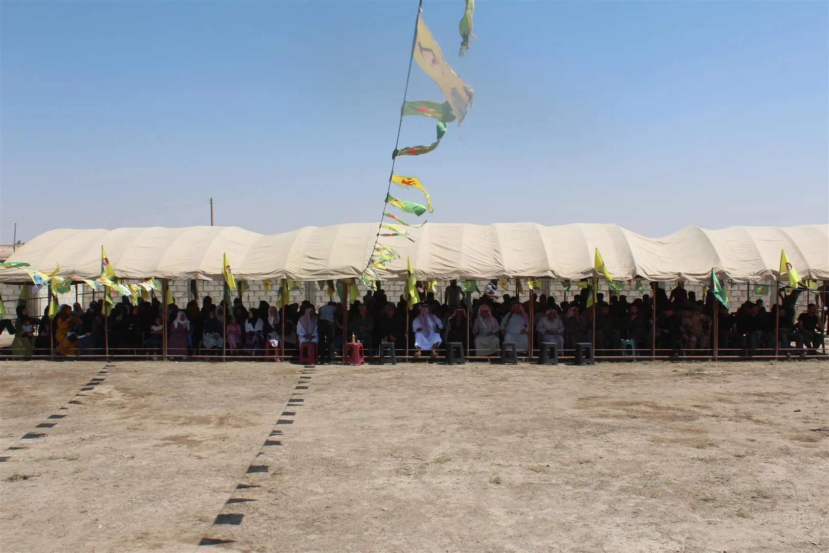 مهرجان خطابي فني في ناحية الهول دعماً لقوات الدفاع الشعبي