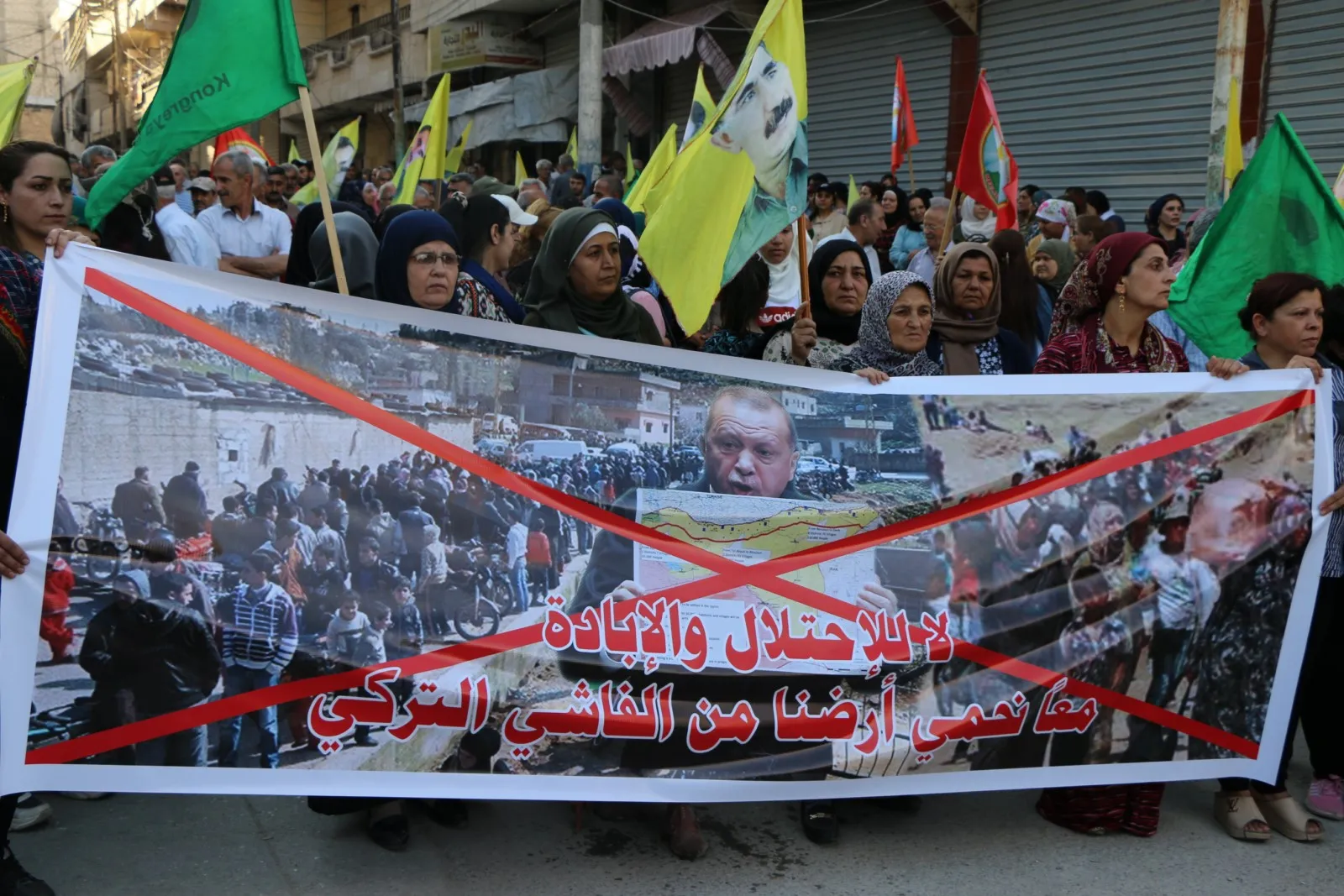 خلال مسيرة حلب... زوجات الشهداء يستنكرن هجمات الاحتلال التركي ومرتزقته على المنطقة