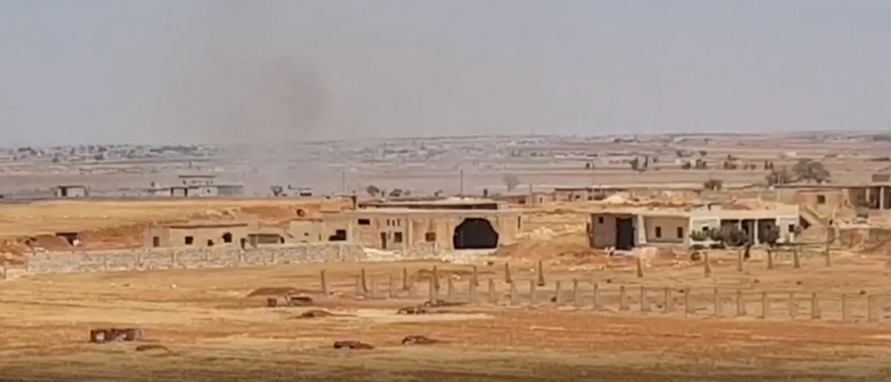 ​​​​​​​اشتعال النيران في حقول أم الحوش جراء القصف المدفعي التركي