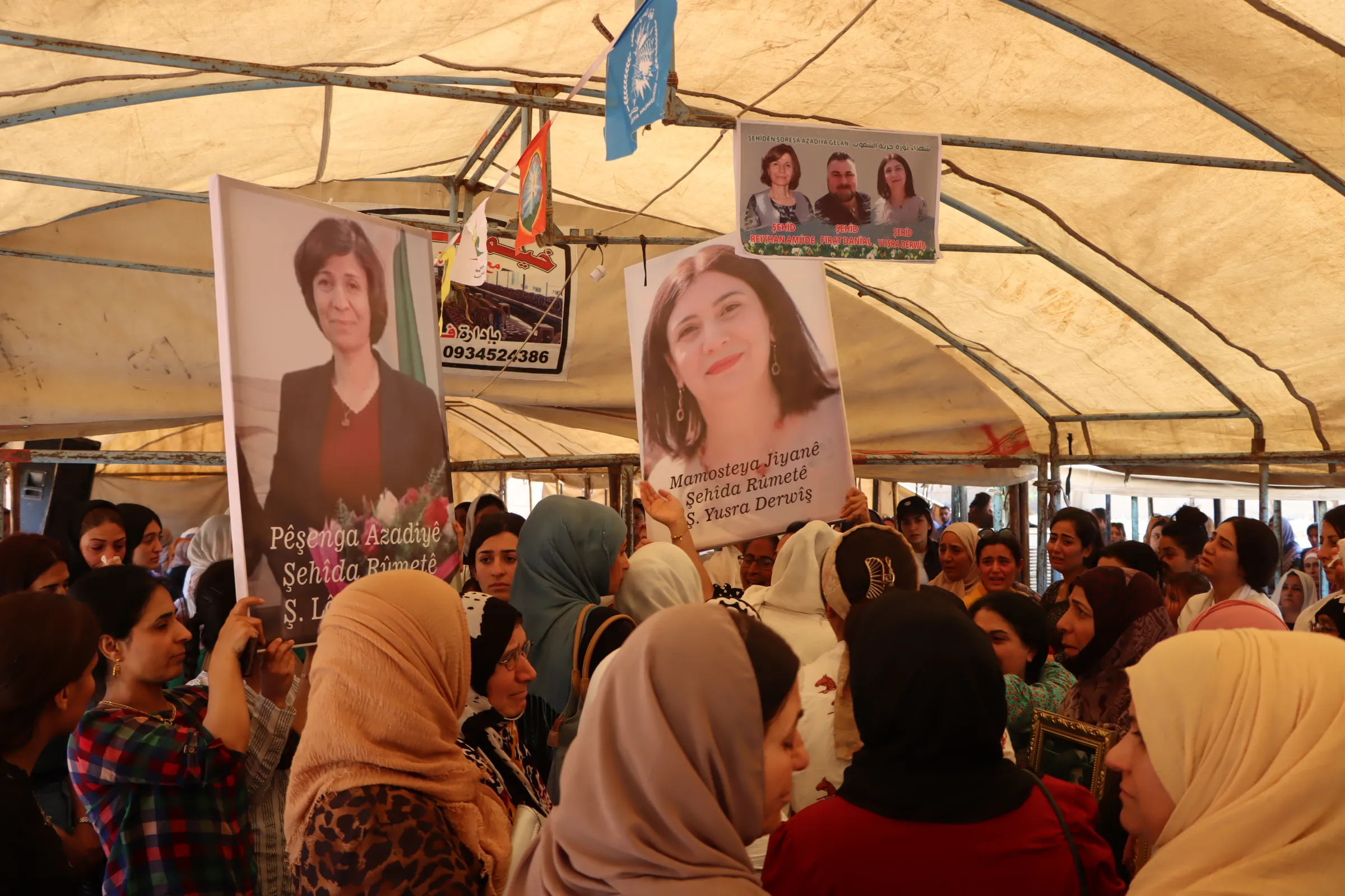 من تحت خيمة عزاء شهداء المجزرة: بإرادة المرأة الحرة وتكاتف الشعوب سننتصر