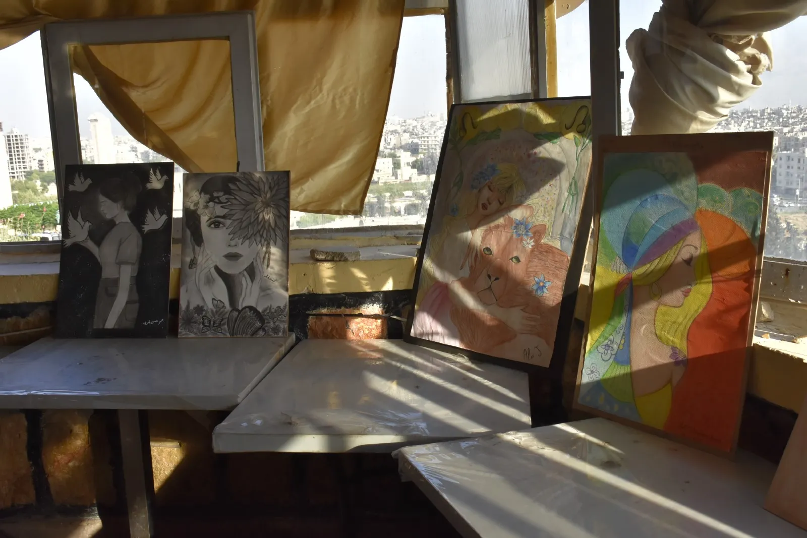 معرض فني ضمن حملة "المرأة الحياة الحرية...نحو الحرية" في حلب