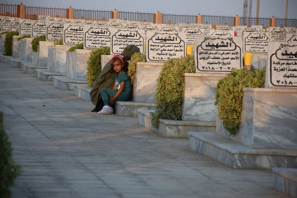 عشية عيد الأضحى إشعال الشموع على أضرحة الشهداء