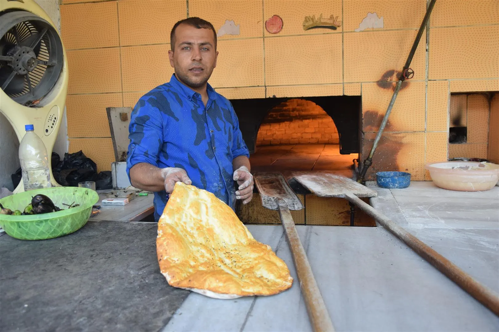 بالصور...عمّال تحت 44 درجة مئوية