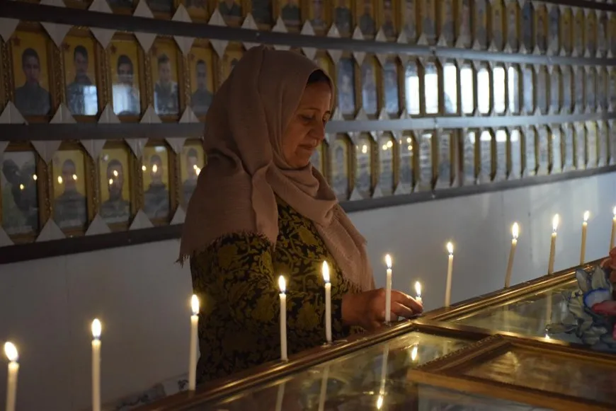 عشية عيد الفطر إيقاد الشموع على أضرحة الشهداء