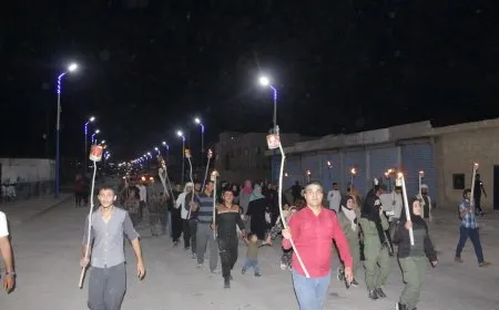 مسيرة في بلدة الهول في ذكرى يوم الشهداء