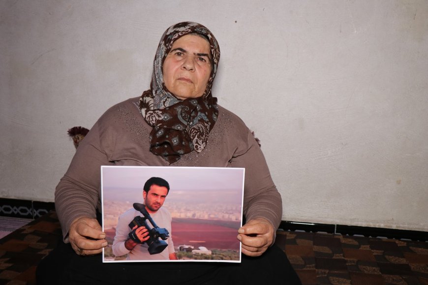 والدة الصحفي سليمان أحمد: أطلِقوا سراح ولدي فإنه لم يرتكب ذنباً