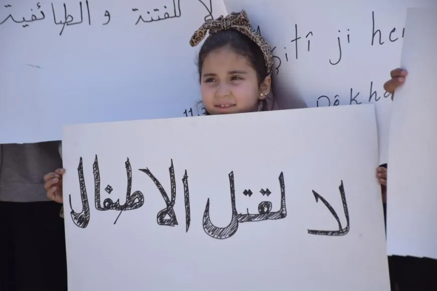 مسيرة في كوباني تنديداً بمجازر الساحل السوري