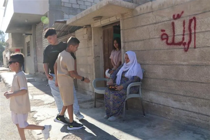 ضحكات وزينة.. مشاهد من فرحة الأطفال بالعيد 