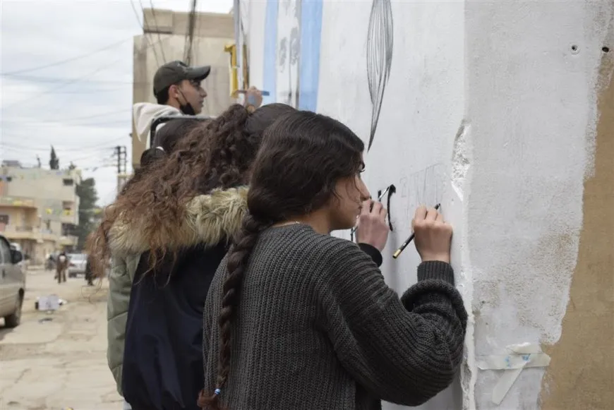 جدارية في الدرباسية تخلّد تضحيات أهالي الشيخ مقصود والأشرفية في حلب