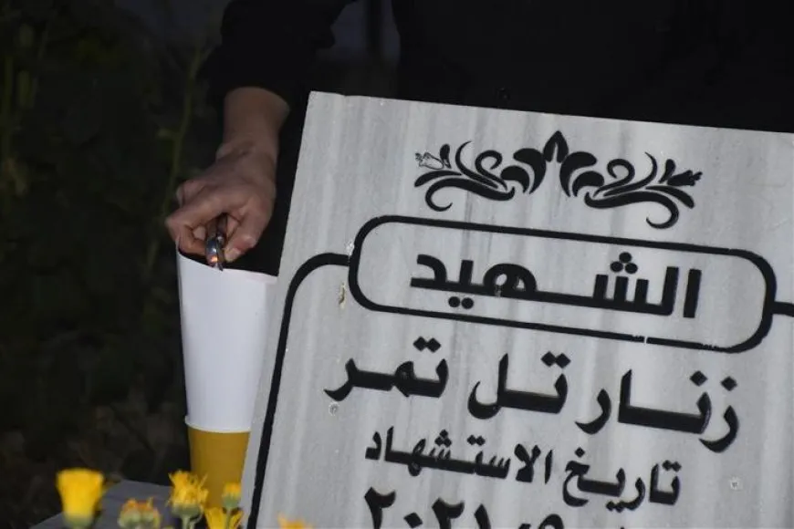 إشعال الشموع على أضرحة الشهداء في روج آفا بمناسبة يوم الشهداء