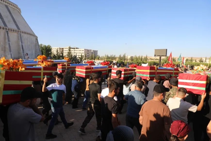 مراسم نقل رفات 18 شهيداً وشهيدة من منبج إلى مدينة كوباني