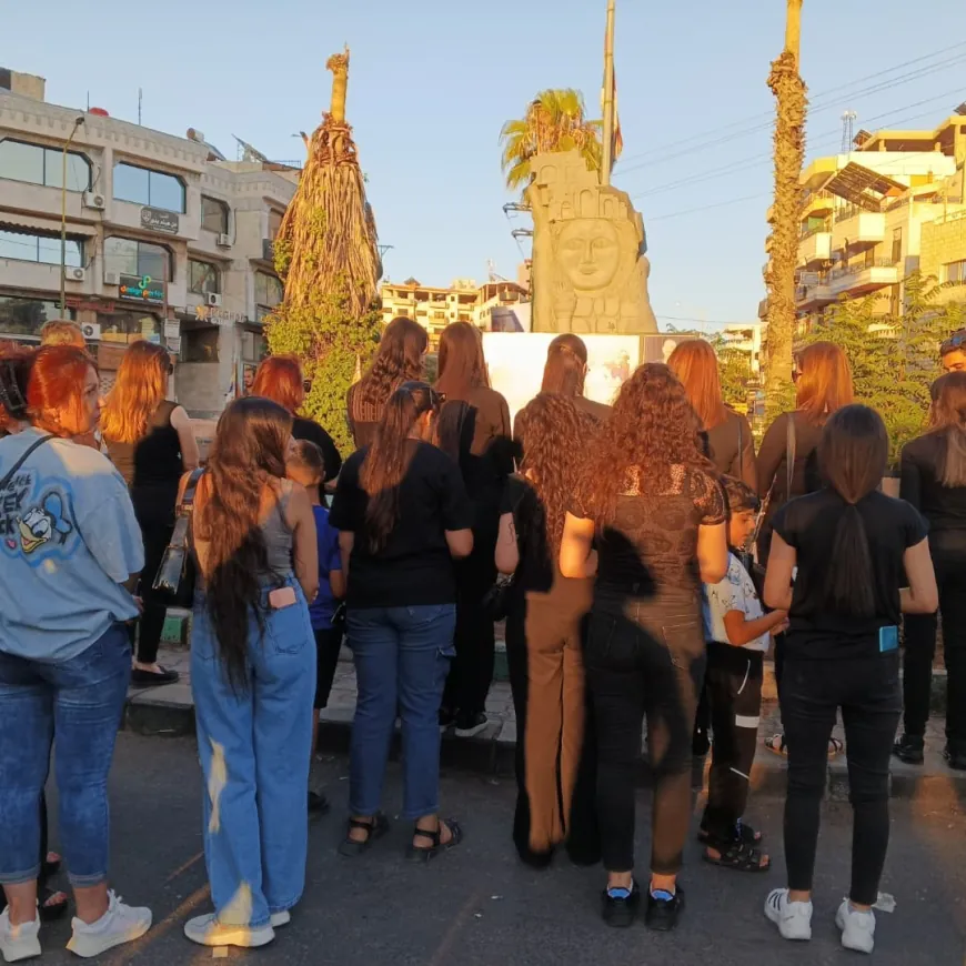إضاءة الشموع على أرواح ضحايا مجازر تموز في السويداء