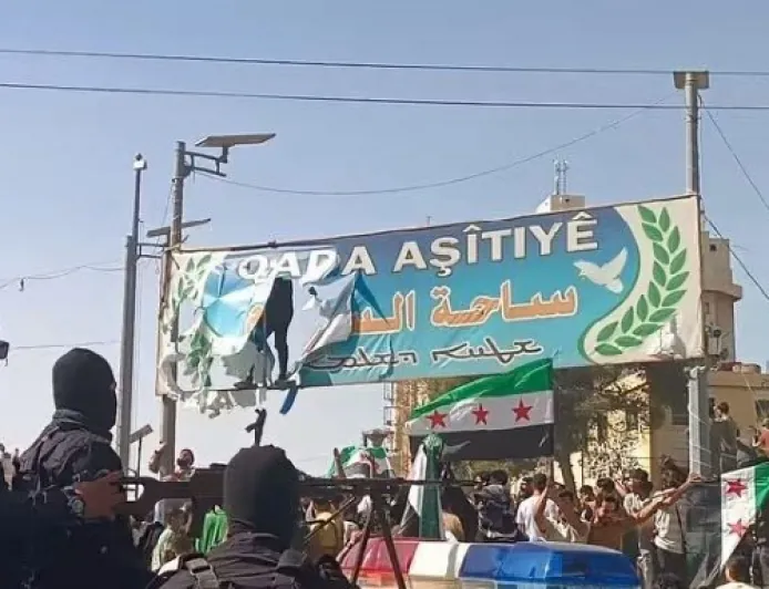 أعمال شغب في ساحة السلام بمدين الحسكة قبيل فعالية رفع علم سوريا