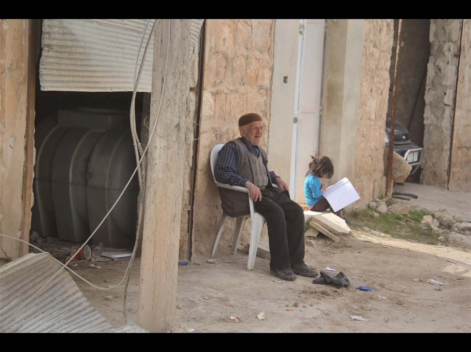 Pictures traced stories of Afrin displaced people in al-Shahba
