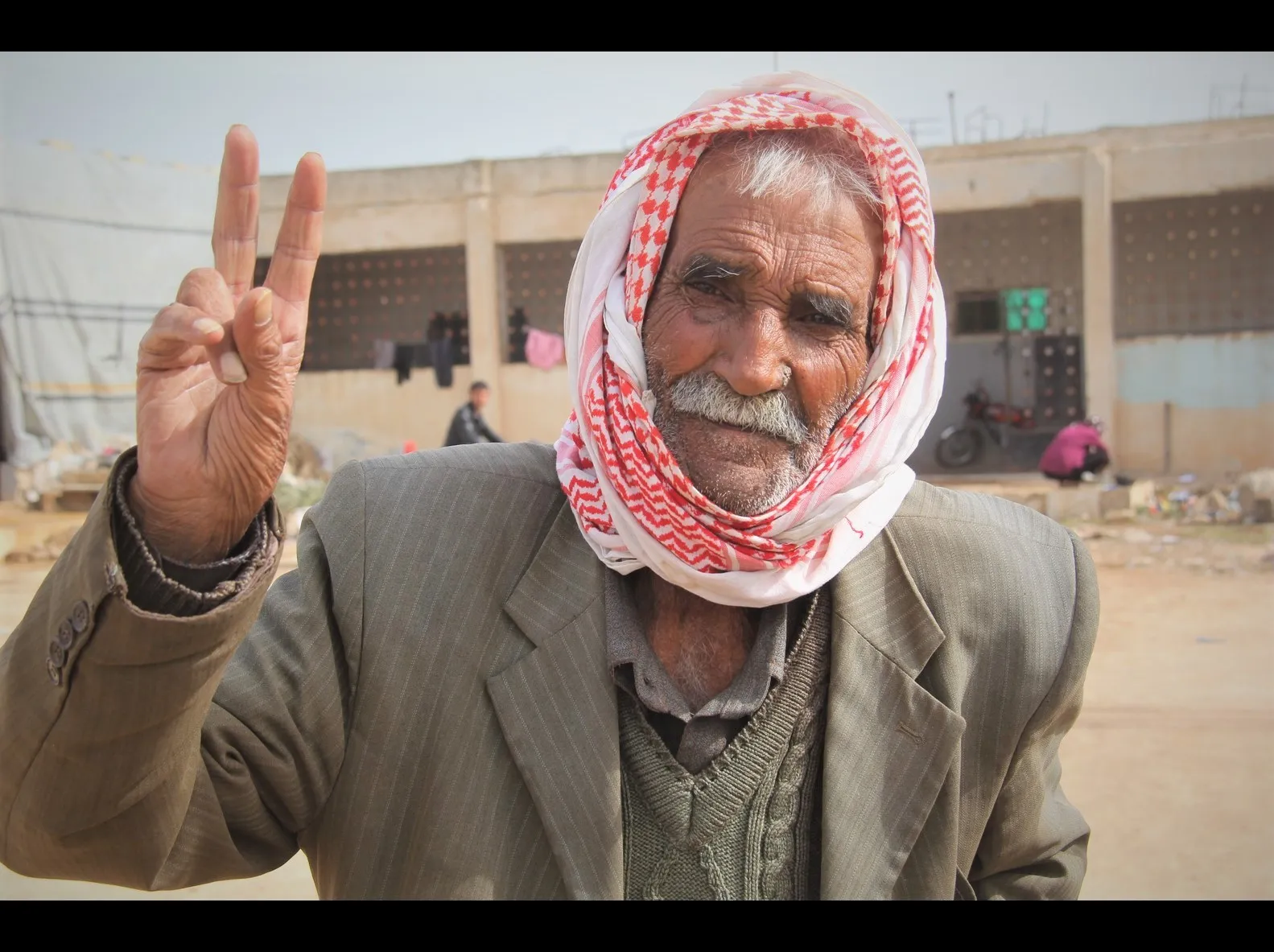 Pictures traced stories of Afrin displaced people in al-Shahba