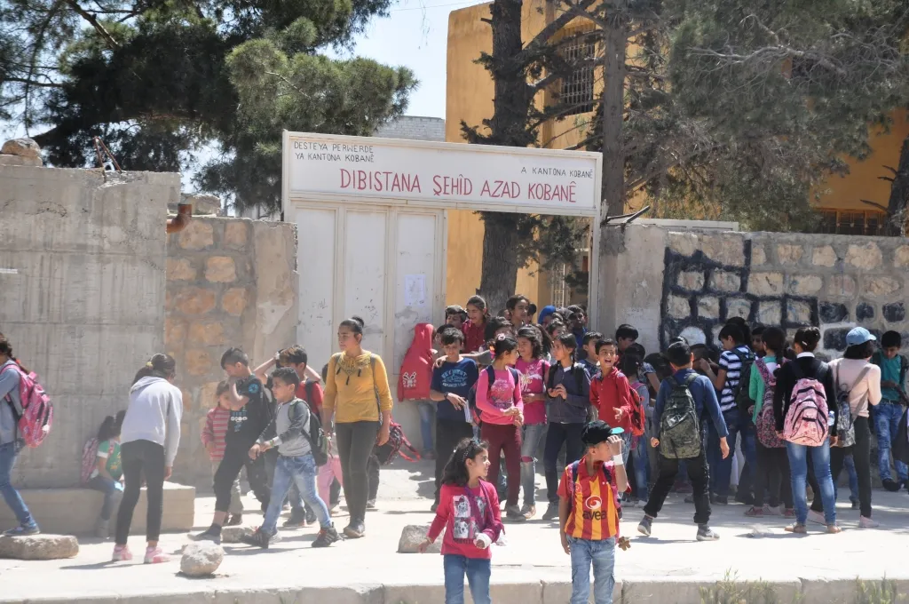 What do Kobani people say about 3years after entering Kurdish language?