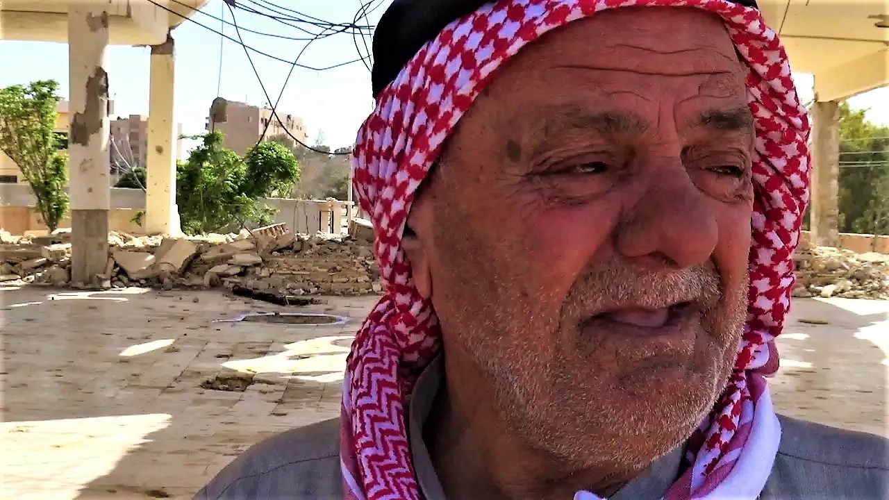 Christans raise cross in al-Tabqa city ,Muslims congratulate ,Christans cries joyfull