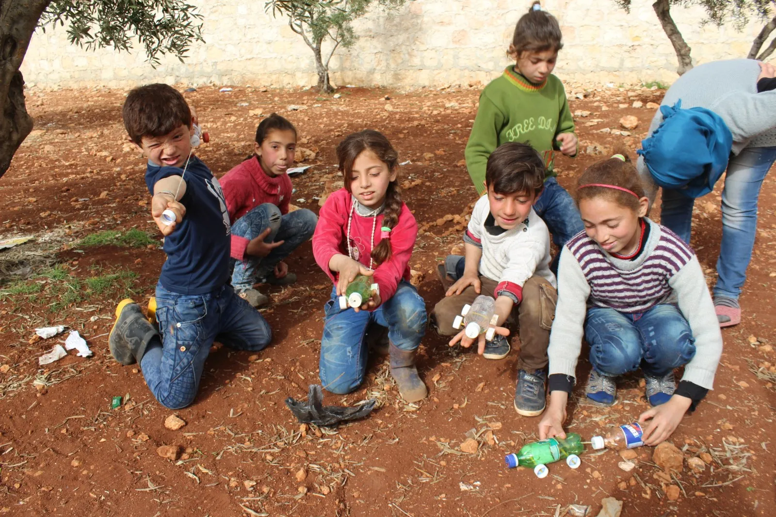 Under deprivation due to Turkish bombardment, Afrin children inventing their toys