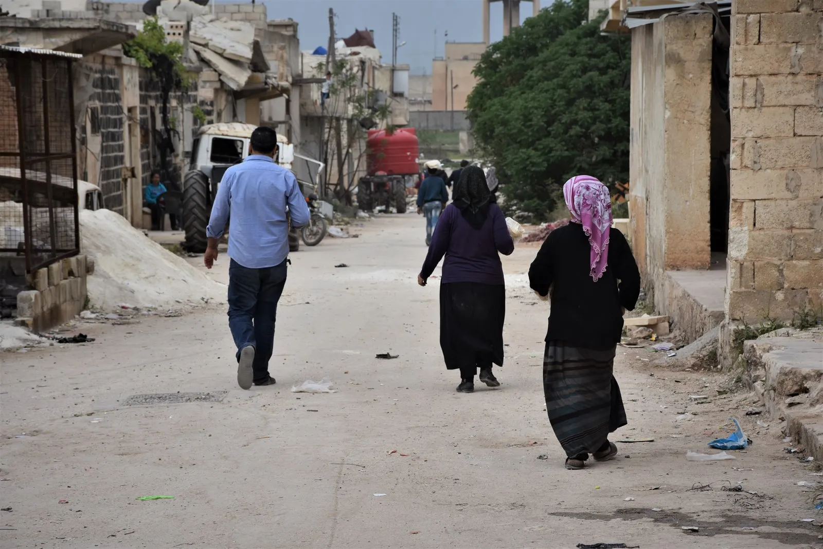 Pictures of Afrin people refusing to move away from it, eager to return