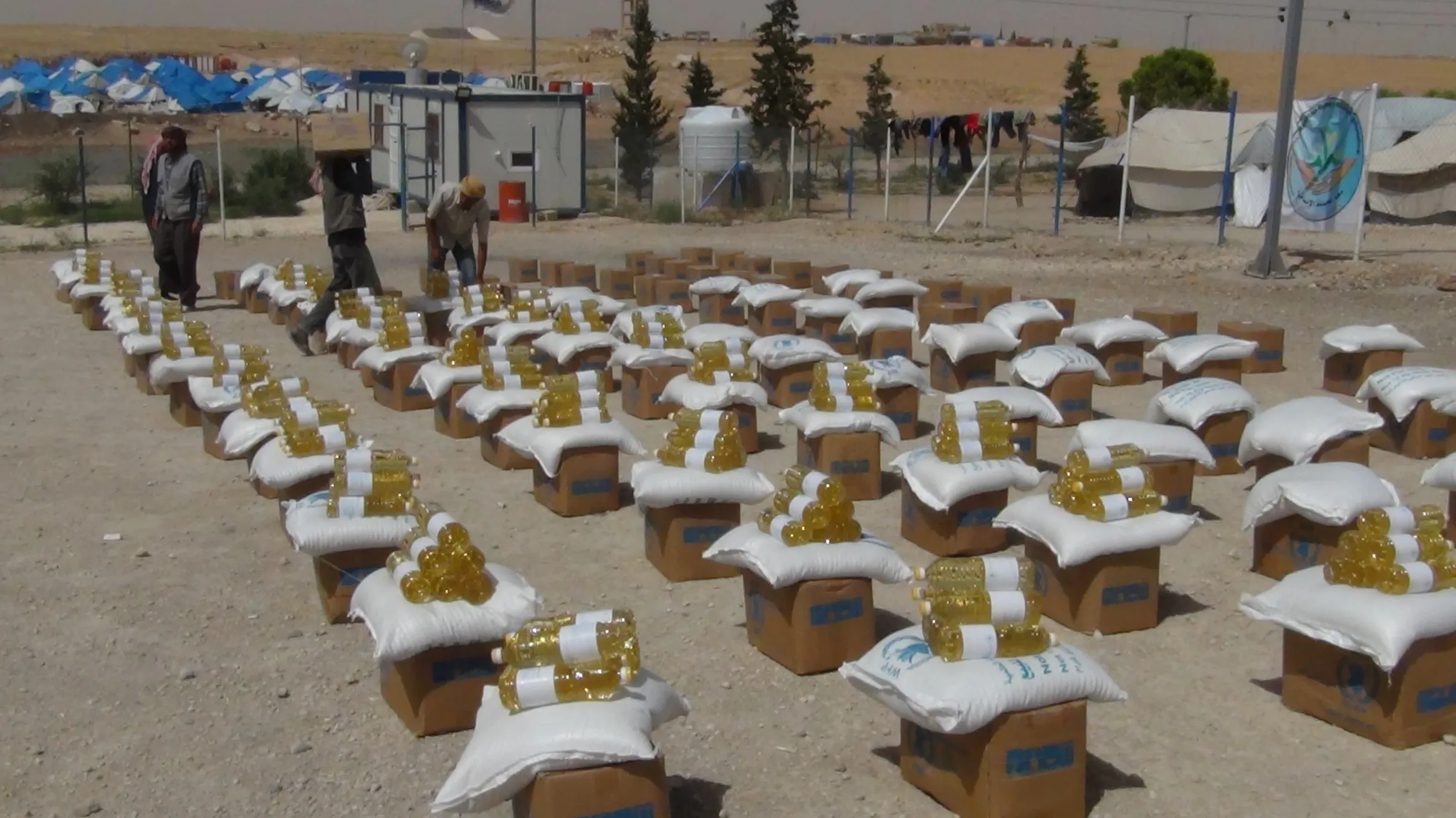 Food rations in Ain Issa camp distributed to refugee in Ramadan month