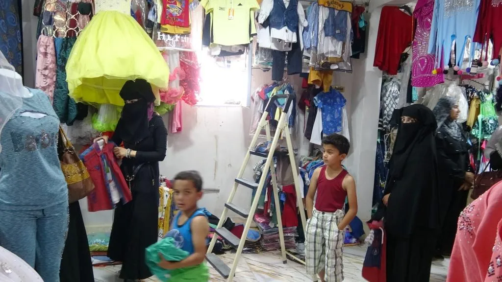 Sweets, Eid clothing ... Ritual inherited by families of Deir ez-Zor's countryside