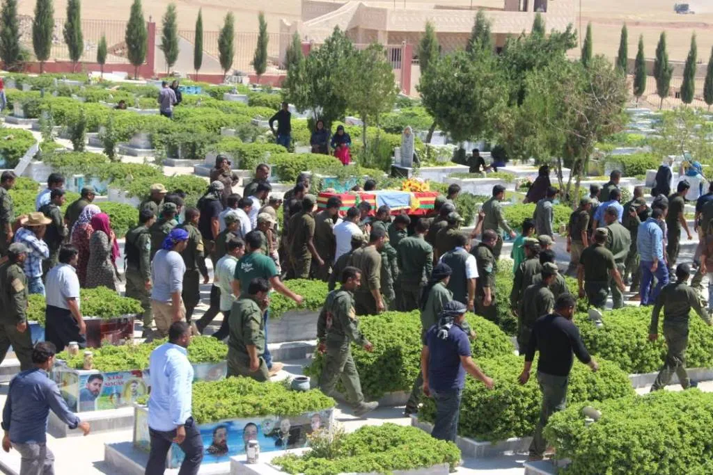 Martyr Restem Jodi Shrine embraced martyr Assad Abed al-Karim's corpse