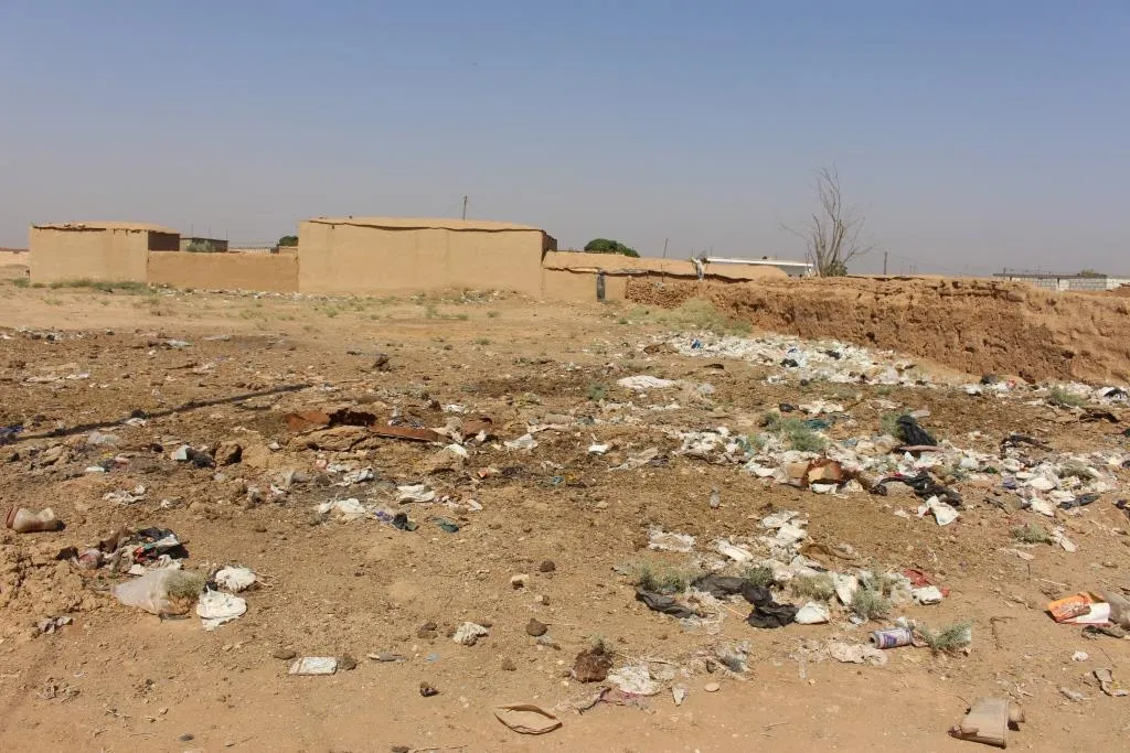 Tel- Hamis .. complains of waste accumulation in streets , neighborhoods