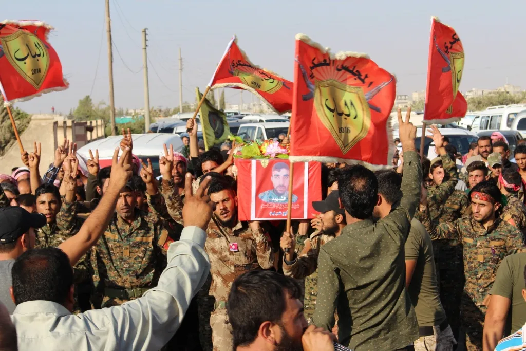Manbij bid farewell martyr's corpse of al-Bab Military Council
