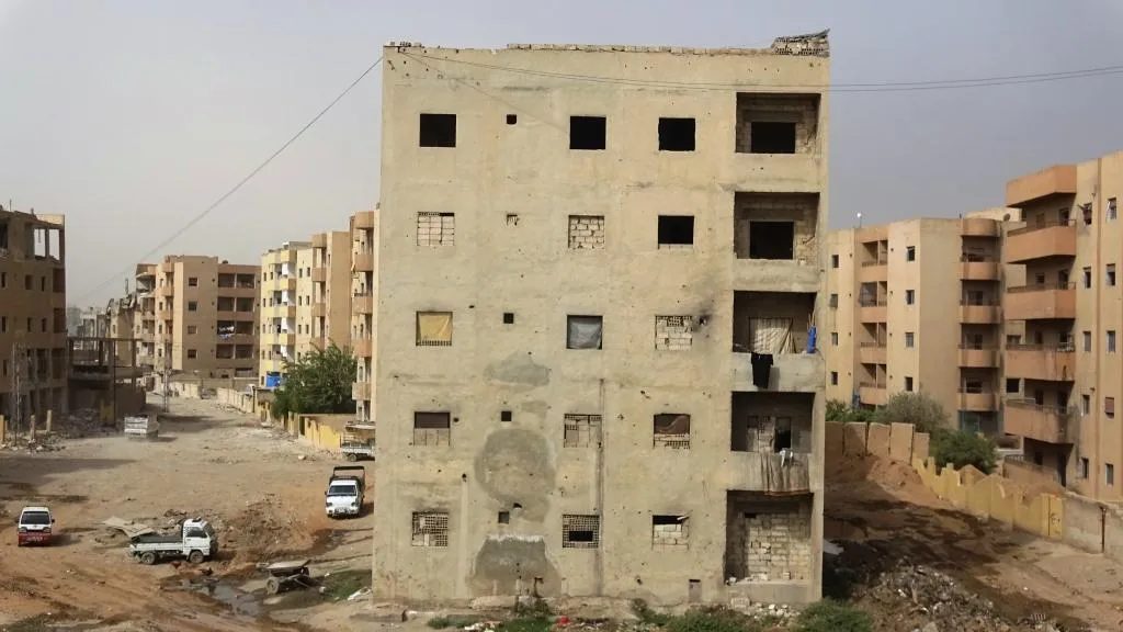 Living in houses without windows, doors, no organization supports them
