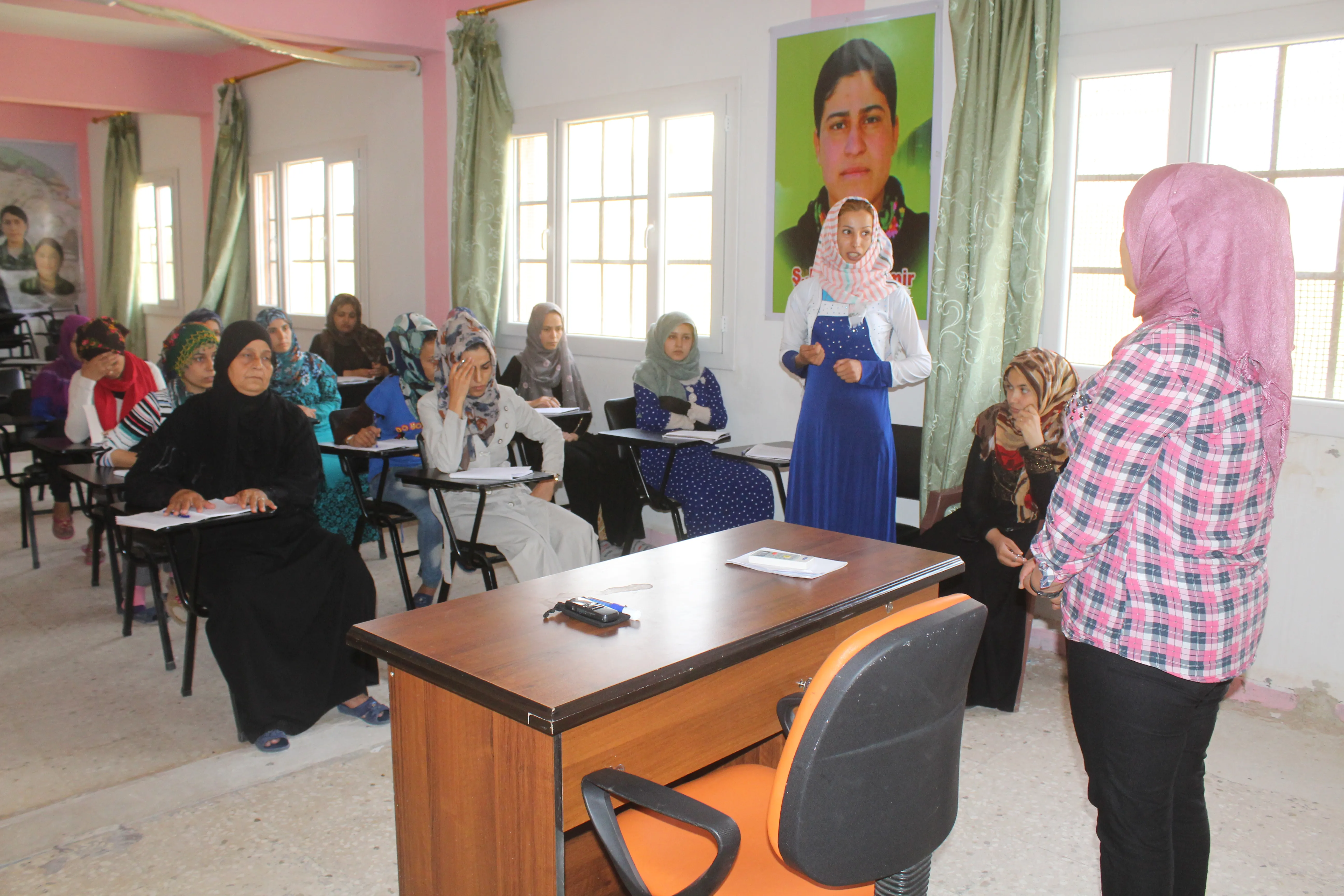 Al-Raqqa's women a year after liberating of IS' blackness-3