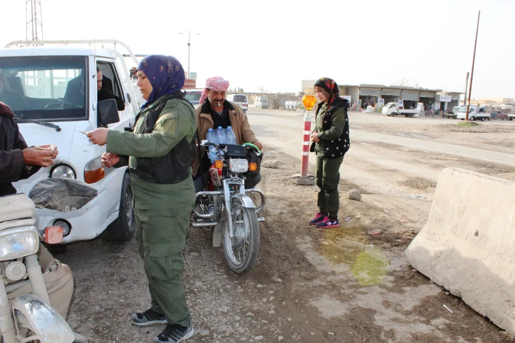 Al-Raqqa's women a year after liberating of IS' blackness-3