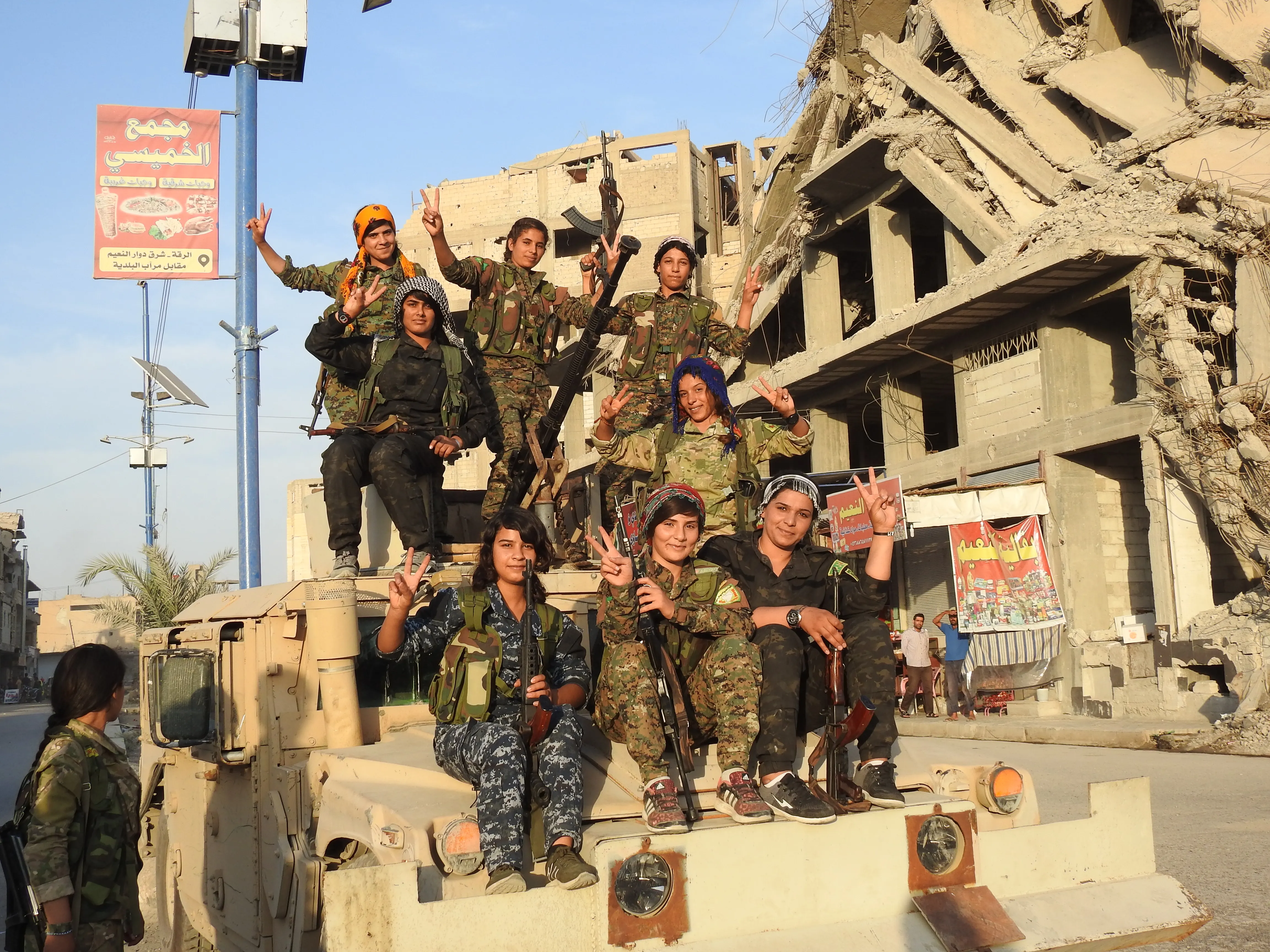 Al-Raqqa's women a year after liberating of IS' blackness-3