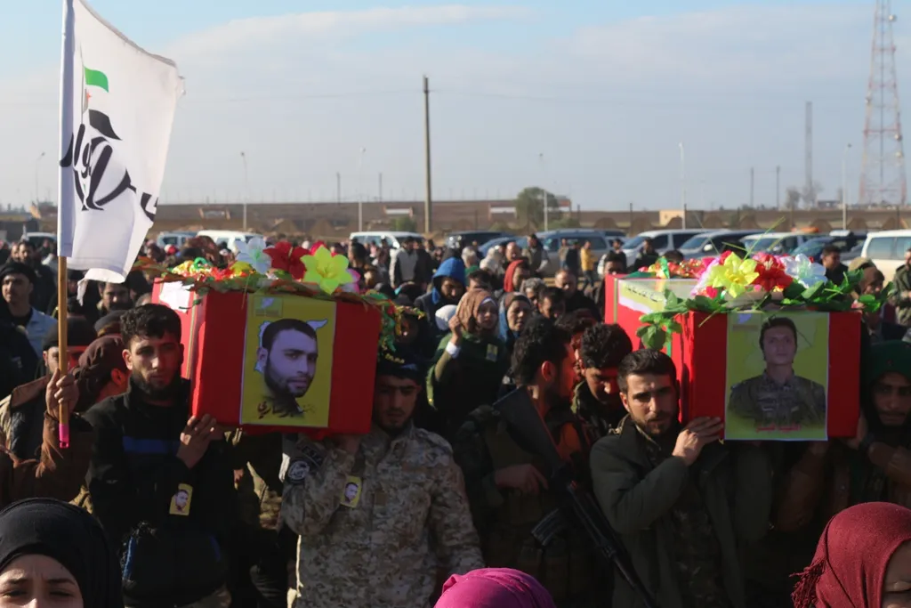 Al-Tabqa people bid farewell 2 martyrs' corpses of al-Thuwar Army
