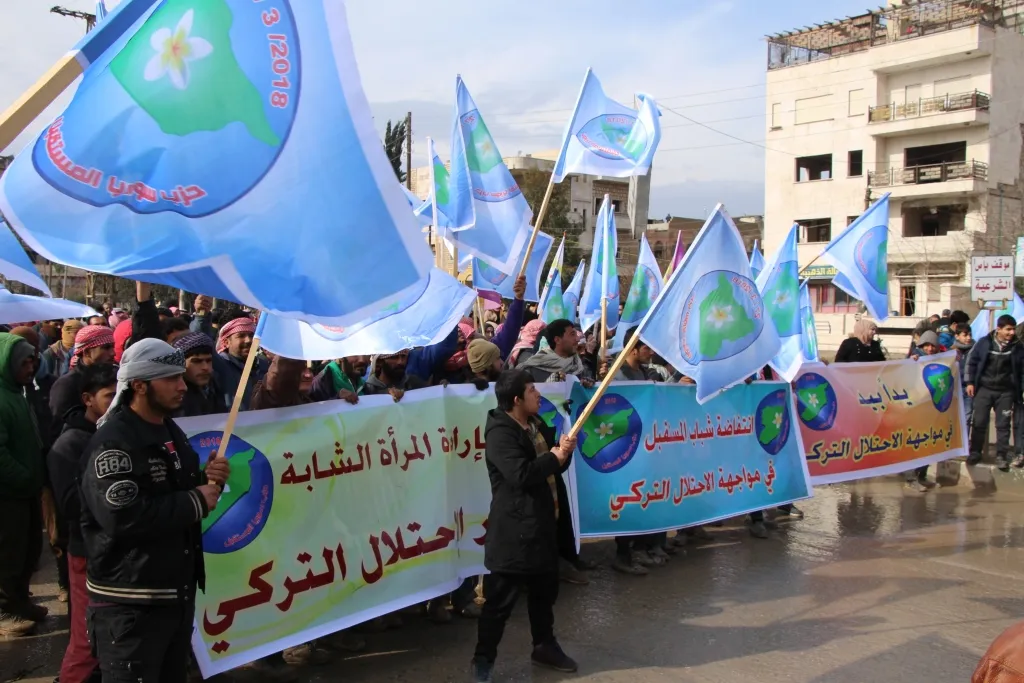 Demo in Manbij under "hand in hand to face Turkish occupation"
