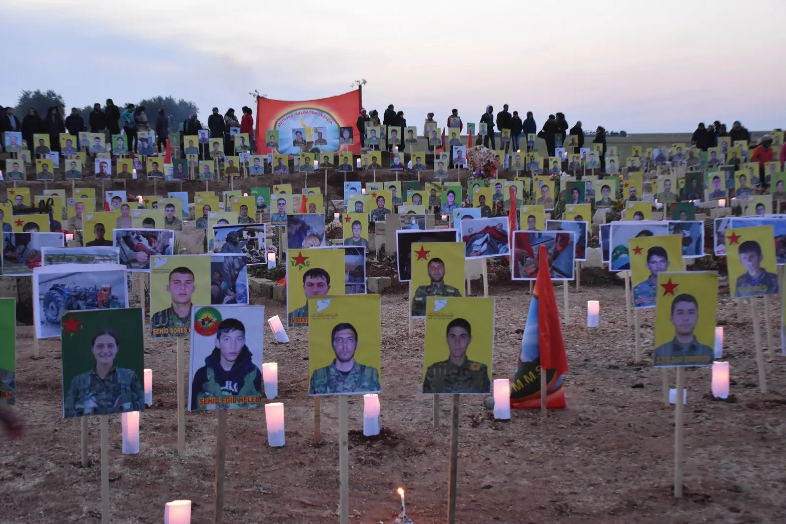 Martyrs' shrine of the Resistance of the age is lit by candles