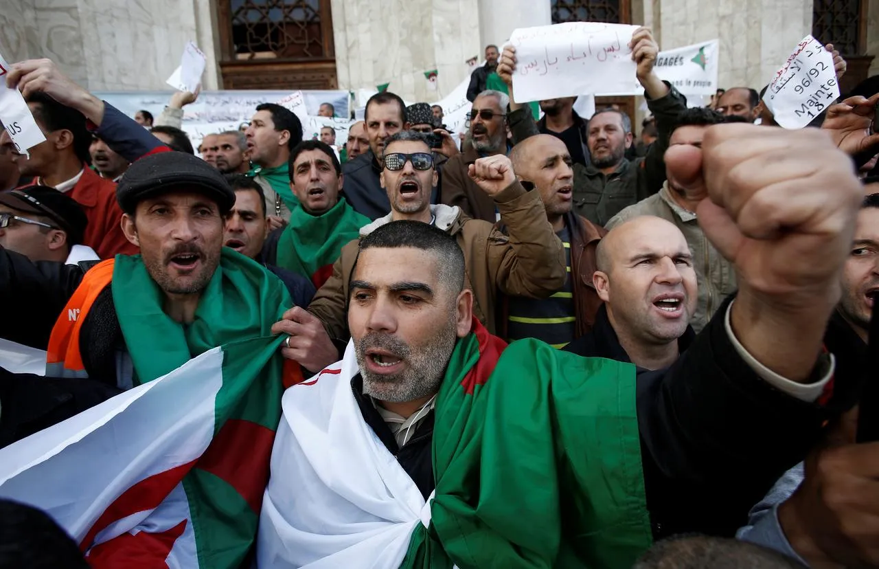 Demonstrators gather in Algerian capital as Bouteflika cling