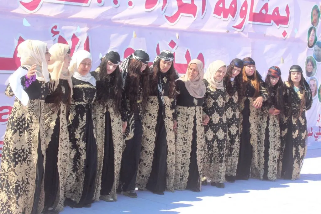 From al-Raqqa celebration, speeches appeal of women's role in society