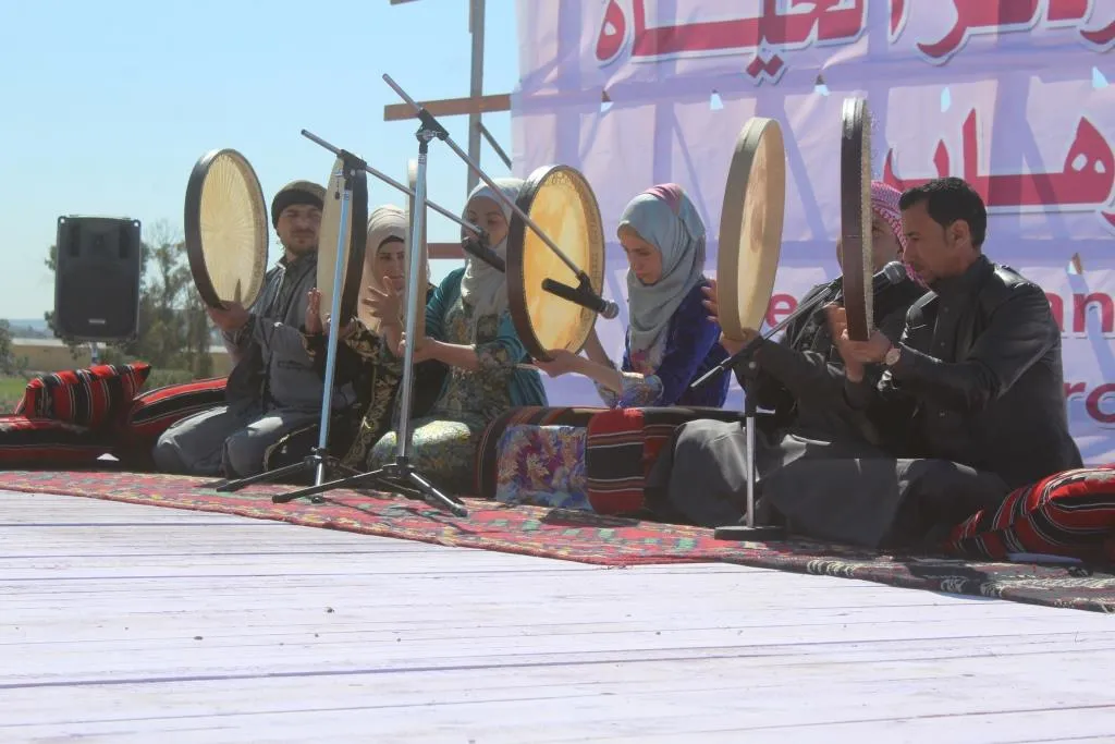 From al-Raqqa celebration, speeches appeal of women's role in society