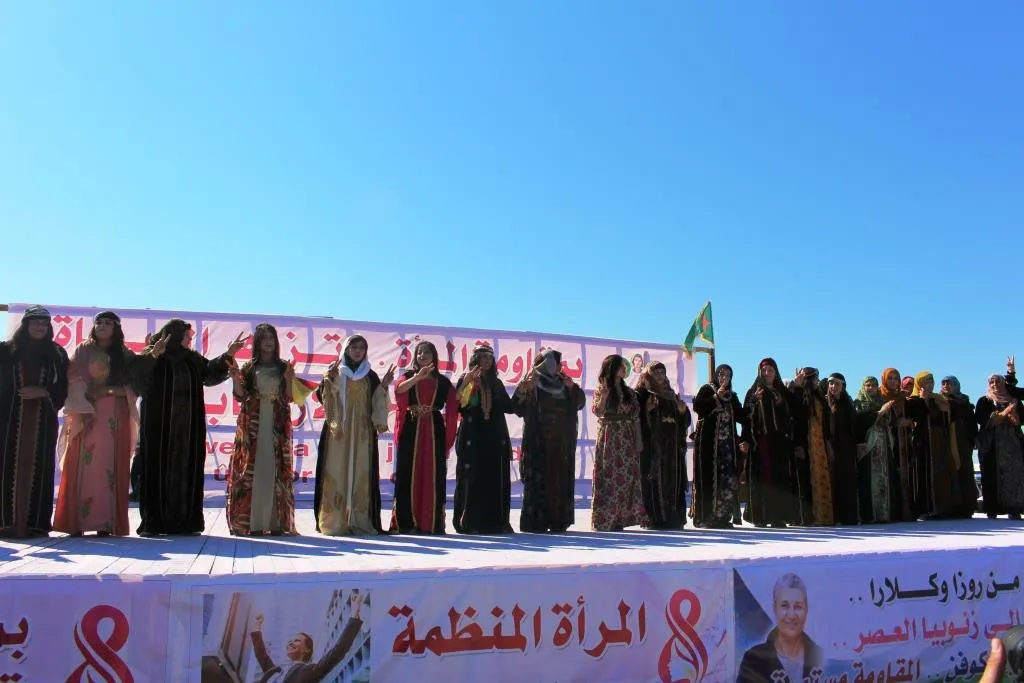 Al-Raqqa women concluded their celebration by saluting strugglers, presenting artistic performances