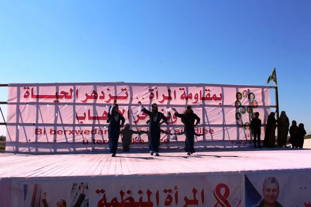 Al-Raqqa women concluded their celebration by saluting strugglers, presenting artistic performances