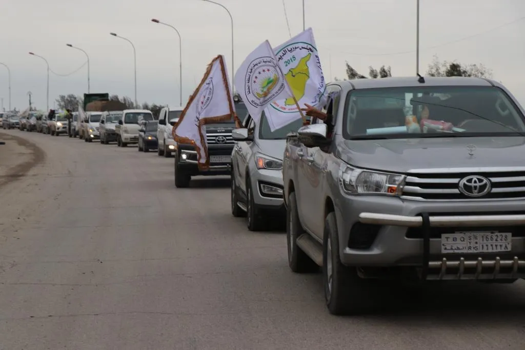 Al-Tabqa people celebrating victory achieved over Daesh